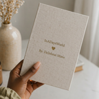 Hand holding journal back cover